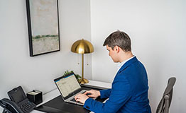 Servcorp client uses a fully equipped private office, perfect for quiet, productive, professional workdays