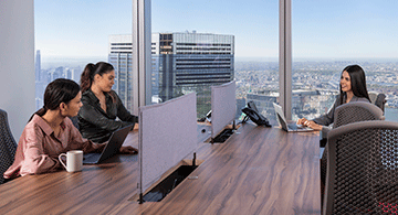 Modern coworking space at 155 North Wacker, Chicago, where clients enjoy fast Wi-Fi and stunning city views.